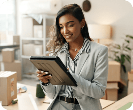 business woman using analytics in laptop